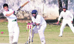 A batsman plays a shot during a match of the Times-Cremica Inter-School Tournament in Chandigarh on Tuesday.