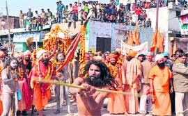 A saint displays his stick-wielding skills in Jwalapur on Tuesday
