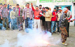Roadways staff rejoice on receiving the government order of their pay hike in Dehradun