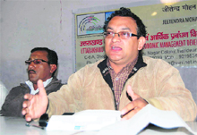 Jitendera Mohan Sharma addresses mediapersons over sugarcane price issuein Dehradun on Wednesday.