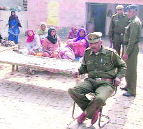Policemen posted at the house of Satish at Kheri Meham village in Rohtak.