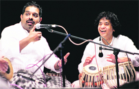 Singer and music composer Shankar Mahadevan and Ustad Zakir Hussain perform at the 10th death anniversary of Ustad Alla Rakha in Mumbai on Wednesday.