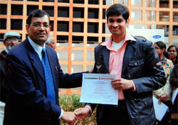 Joint Secretary, Government of India, Suneel Kumar honouring engineering student Smeet Jindal in New Delhi on Republic Day.