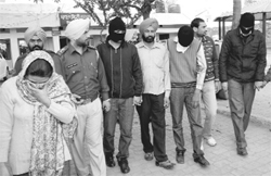 Accused being taken to a court at Rajpura on Thursday.