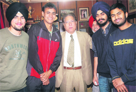 Winners of the All-India Inter-University Lawn Tennis Championship held at Hisar with Vice-Chancellor Prof RC Sobti at the PU, Chandigarh, on Thursday.