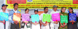 Activists spread the message on cancer prevention outside Delhi Secretariat in New Delhi on the occasion of World Cancer Day on Thursday. 