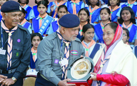 Bharat Scouts & Guides from Nashik present a memento to President Pratibha Patil at the Rashtrapati Bhavan in New Delhi on Thursday.