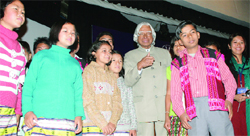 Former President A.P.J. Abdul Kalam interacts with children from Arunachal Pradesh during the International Conference on Children's Libraries in New Delhi on Thursday.