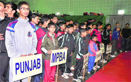 Teams line up at the inauguration of the All-India Junior Ranking Prize Money Badminton Championship in Haridwar on Thursday.