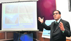 Dr MM Kimothi, Director, Uttarakhand Space Application Centre, Dehradun, addresses the inaugural session of a workshop of the United Nations World Food Programme in the city on Thursday.
