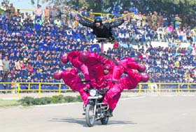 Members of the world record holder BSF daredevil team perform at the Haryana Police Academy, Madhuban, in Karnal