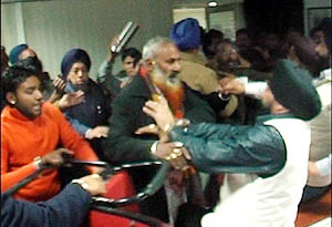 Senior Deputy Mayor Kamaljit Singh Bhatia being thrashed by MC employees.