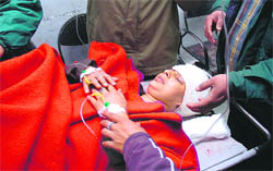 Head Constable Vandana Jamwal, who was injured in a minibus accident, being shifted to GMCH, Jammu