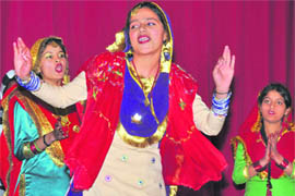 Students perform during a talent search contest at the SRS Government Polytechnic Colege for Girls in Ludhiana on Thursday.