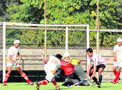 Teams of Namdhari XI and Indian Air Force in action during the sixth All-India Guru Gobind Singh Hockey Tournament in Ludhiana on Thursday.