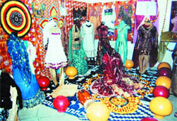 Clothes and artifacts on display in the Glitterati Fashion Exhibition at BBK DAV College for Women in Amritsar