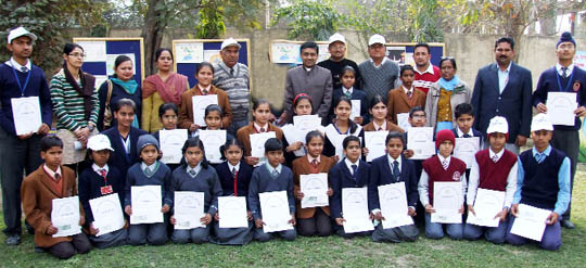 Winners of poster competition against drug abuse pose with DIG Jitendera Jain and other invitees in Bathinda