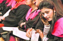 A newly wed girl seems to be informing her husband over her phone that she had received her degree at the annual convocation of the SDP College for Women in Ludhiana