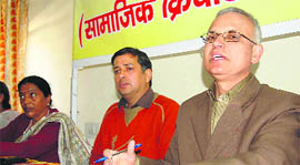 Lokesh Navani of Dhaad addresses a press conference in Dehradun on Saturday.