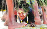 A Gujarati artiste performs Siddi Goma dance at a chaupal at the Surajkund Crafts Mela in Faridabad 