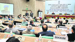 Prime Minister Manmohan Singh addresses the conference of Chief Ministers on price rise in New Delhi 