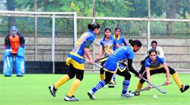 Players of Central Railway, Mumbai, and Chandigarh XI in action during the 6th All-India GGS Gold Cup Hockey Tournament in Ludhiana
