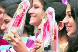 Jubiliant winners flaunt their trophies at the annual prize distribution function of Guru Nanak Girls College in Ludhiana on Saturday