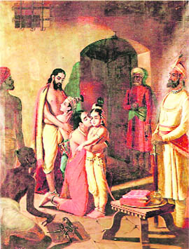 Krishna and Balram freeing Vasudev and Devaki after killing Kansa.