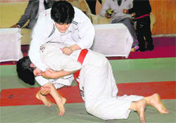 Participants in action during the All-India Inter-University Judo Championship.