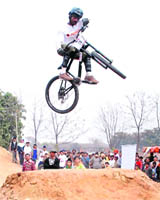 A cyclist in action during a mountain biking competition held in Mohali on Sunday.