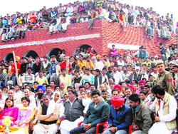 A crowd at a cultural mela in Badalgarh village