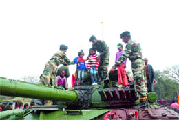 Children get to know about the working of a tank during the Know Your Army exhibition organised by the Vajra Corps in Jalandhar.