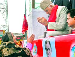 Union Minister for New and Renewable Energy Farooq Abdullah being greeted by a party worker in RS Pura on Sunday
