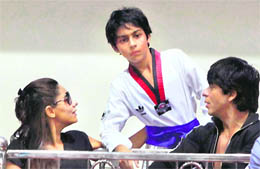 Bollywood actor Shah Rukh Khan along with his wife Gauri attend a tae kwan do meet to cheer their children Aryaan and Suhana (not in picture) who were participating in the event in Mumbai on Sunday. 