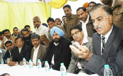 (From right) Chairman of the Improvement Trust Ashok Bharti, Deputy Commissioner Rahul Tewari and Mayor Baljit Singh Birbehman addressing media at the Transport Nagar in Bathinda