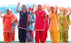 Students participating in a cultural show on the annual function of the Mata Sundari Girls College at Tade village in Bathinda