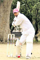 A batsman in action at the Suresh Chand Goyal Memorial Cricket Tournament in Dehradun on Monday.