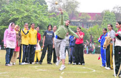 A girl takes part in shot put competition during the annual athletics meet of Guru Nanak Girls College, Ludhiana,