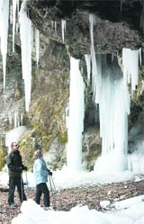 Walkers gaze at ice formations at a cave near Allmendingen, Germany, on Sunday.