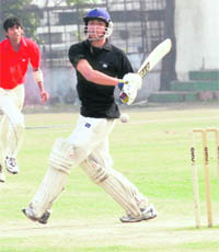 A batsman plays a shot during a match at DAV School, Sector 8, Chandigarh, on Tuesday.
