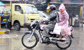 A couple on a motorcycle