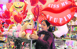 A woman haves a look at a soft toy