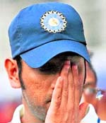 Nowhere to hide: MS Dhoni reacts during the presentation ceremony after India lost the first Test against SA in Nagpur on Tuesday. This was his first Test loss as captain.