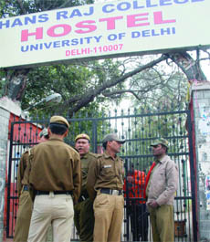 Policemen stationed outside the hostel of Hans Raj College in New Delhi on Wednesday.
