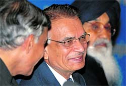 Parliamentary Affairs Minister Pawan K Bansal with Punjab Governor Shivraj Patil and Punjab Chief Minister Parkash Singh Badal in Chandigarh on Wednesday
