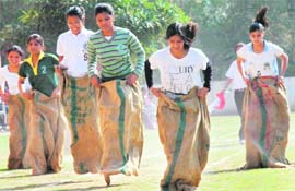 Students take part in the sack race event at the 25th Annual Athletics meet at Guru Gobind Singh College for Women in Sector 26, Chandigarh, on Thursday.