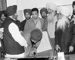 Sugarfed chairman Sukhbir Singh Vahla seeks blessings from Deputy Chief Minister Sukhbir Singh Badal in Mohali on Thursday.