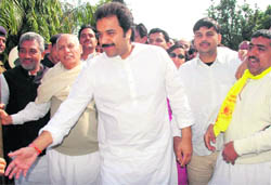 HJC supremo Kuldeep Bishnoi, along with senior party leaders, comes out of Haryana Raj Bhawan after giving a memorandum to the Haryana Governor in Chandigarh