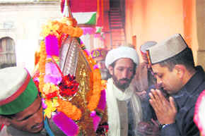 First major Shivratri deity along with its pujaris at Mandi on Thursday.