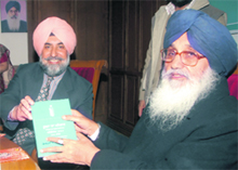 Punjab Chief Minister Parkash Singh Badal releases Punjabi version of the RTI Act 2005, in Chandigarh on Thursday.